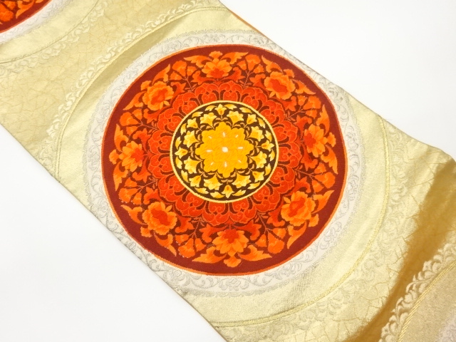 丸文に華紋・草花模様織出し袋帯